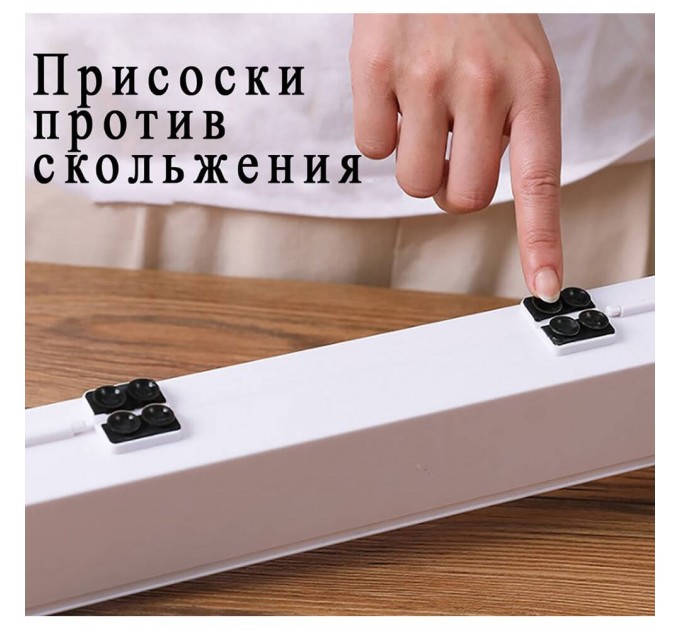 Організатор для харчової плівки з ножем.