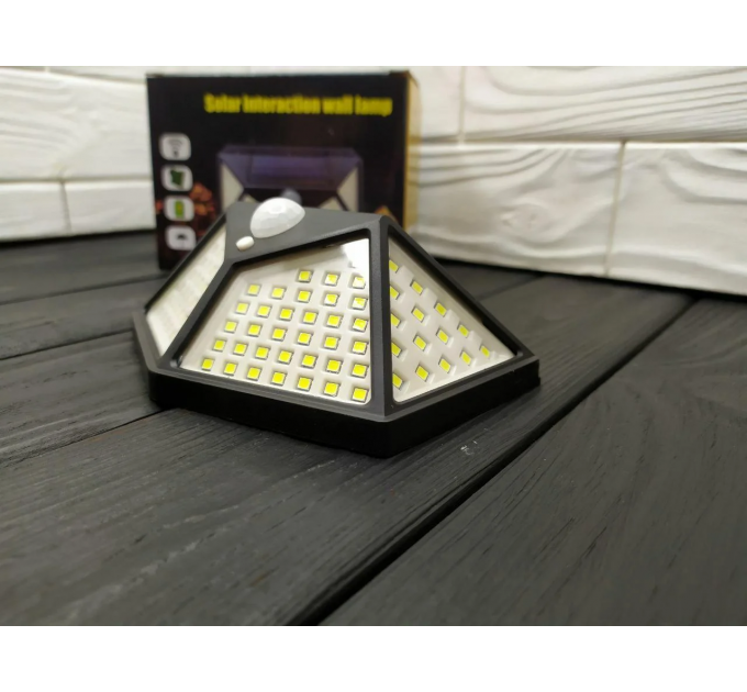 Світильник з датчиком руху на вулицю на сонячній батареї solar interaction wall lamp 100 LED